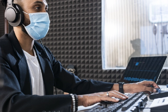 Audio engineer mixing sound