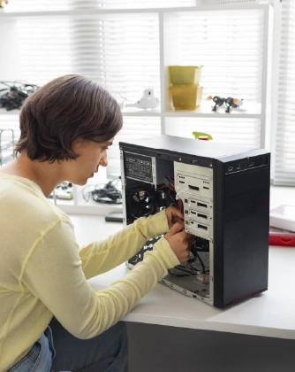 Person assembling computer tower